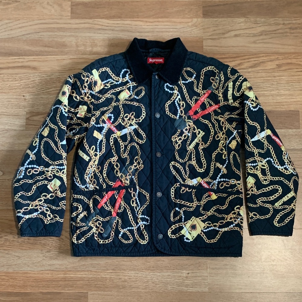 Supreme Black Quilted Jacket with Gold Chain and Red Accents